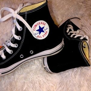 black and white Converse shoes.